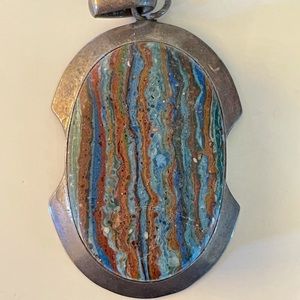 One-of-a-kind precious stone pendant
